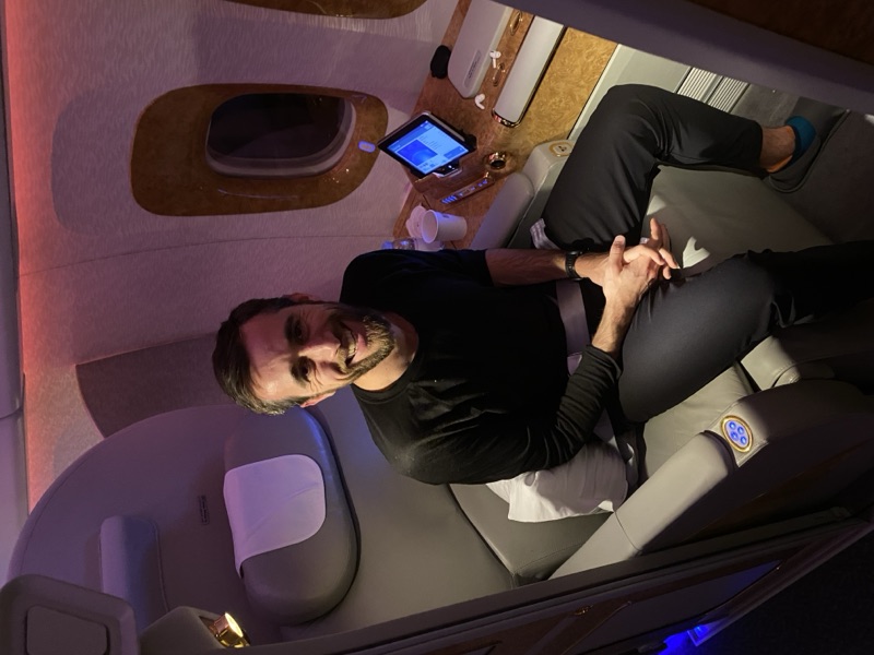 Ross Bradley in his Emirates First Class suite, Milan to New York